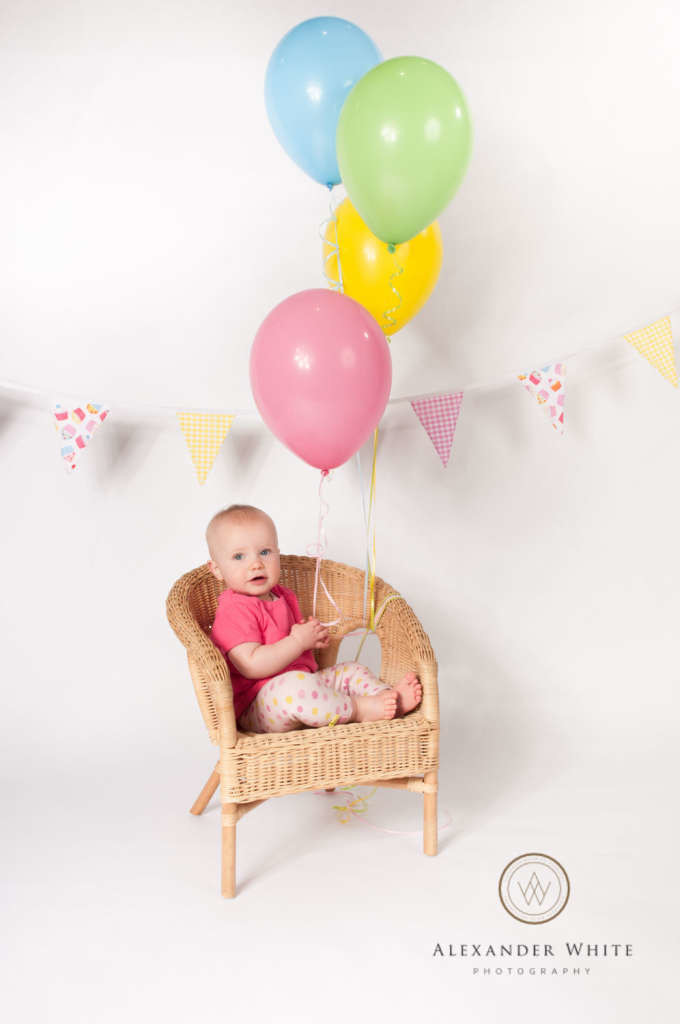Toddler portrait before cake smash