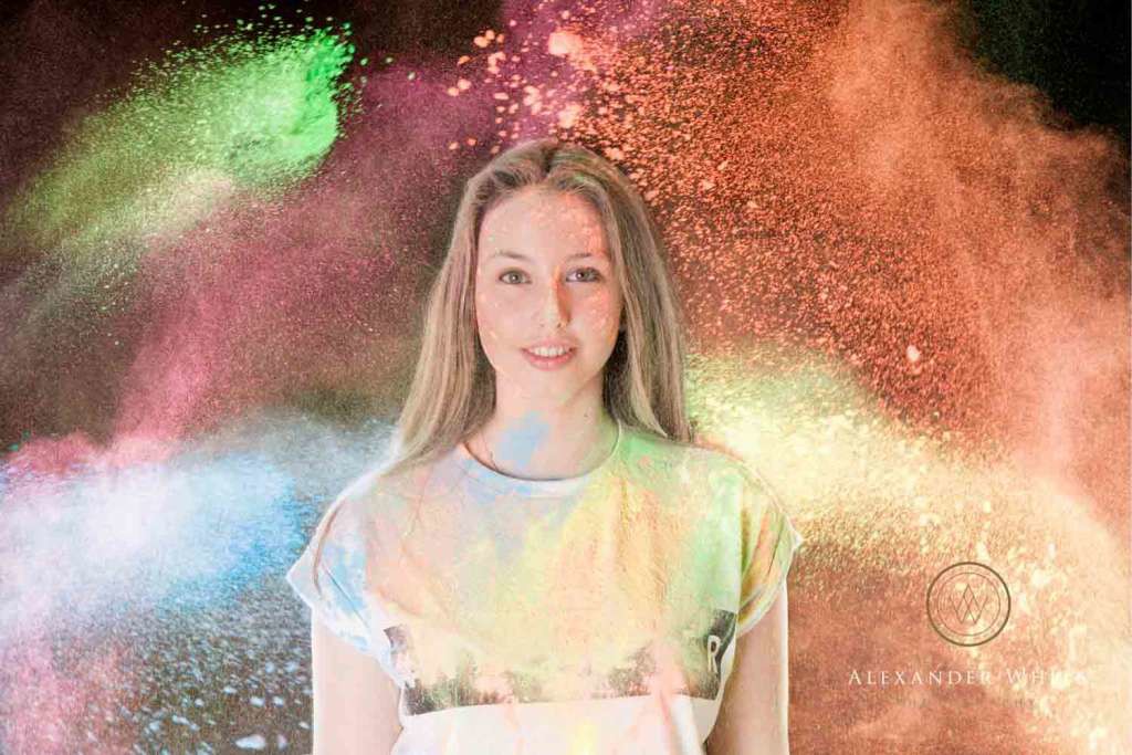 Standing dead still whilst various different colours of powder paint was thrown at them was hard work for the girls