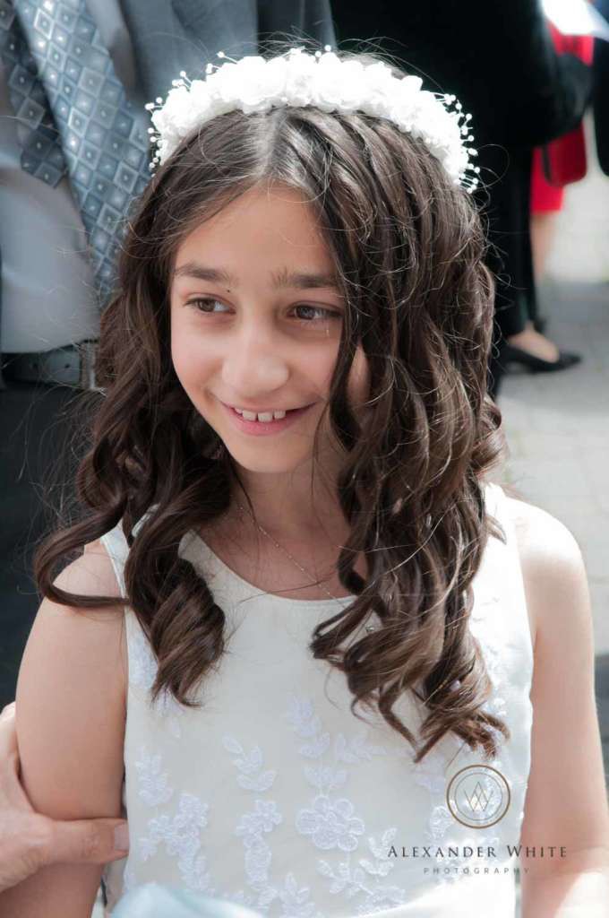 The young lady getting ready for her first Communion.