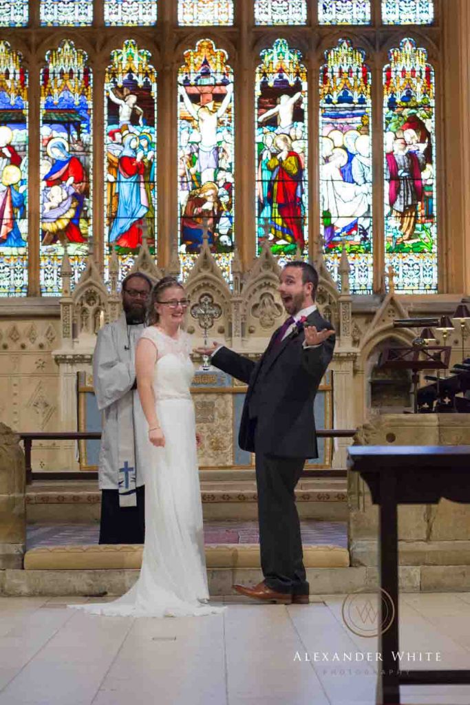 Wedding Bride and Groom at the altar of St Mary's Church in Horsham