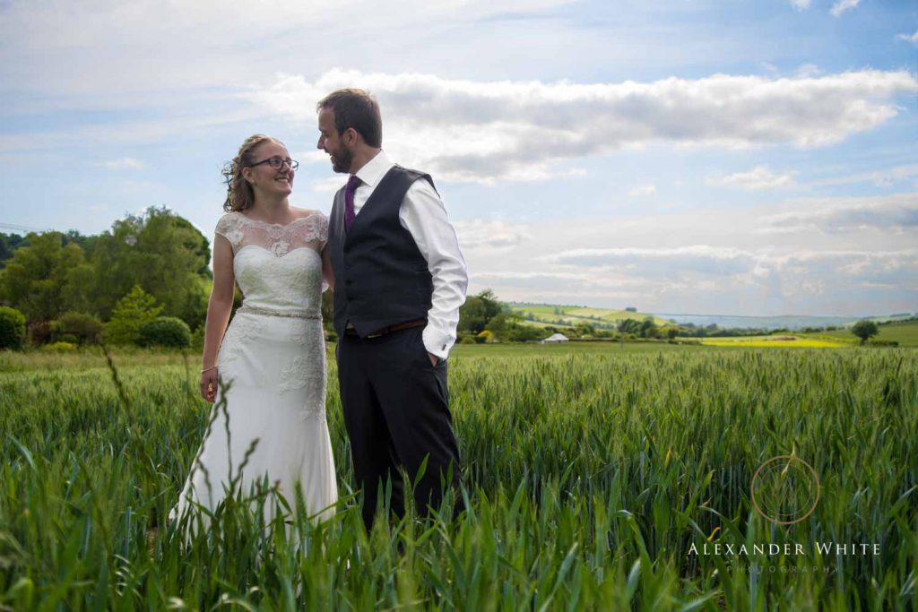 Couple Photo of the Bride and Groom in a field