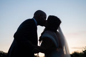 wedding photo of couple kissing