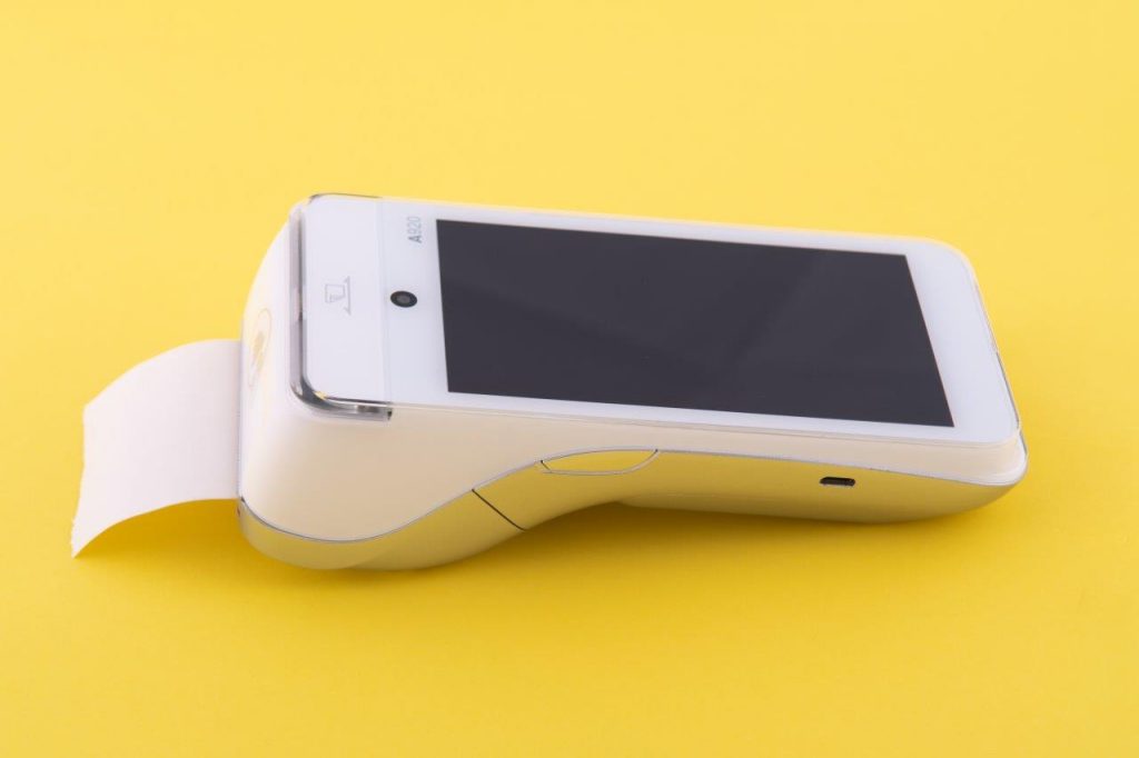 A Handheld POS device that I photographed for flight retailer Tourvest