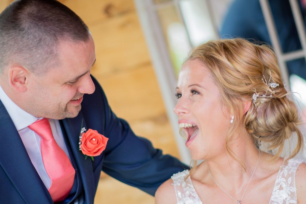 Wedding photography in West Sussex image of couple laughing