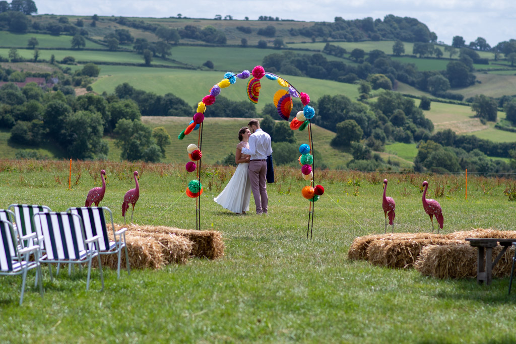 The bride and groom enjoy a private moment together before the wedding