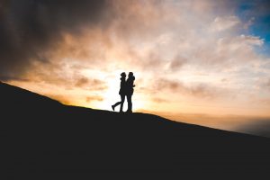 Alex and Emily hugging