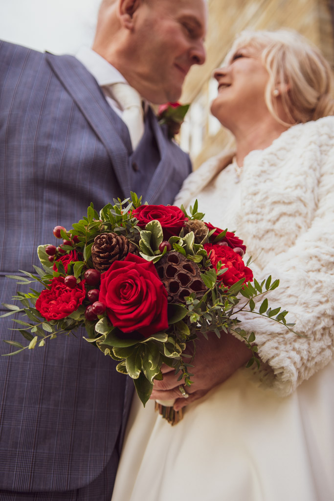 Bride and Groom wedding bouquet detail photo