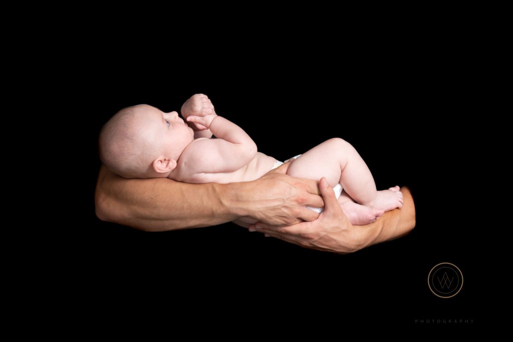 newborn baby photo with baby in arms
