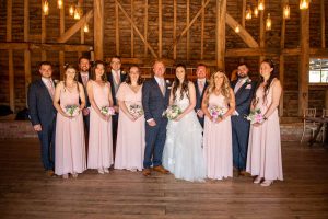 Bridal party in a barn
