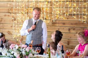 Groom at a wedding giving his speech
