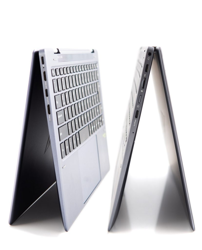 Two laptops showing the flexibility of the laptop hinge in product photos for a start-up