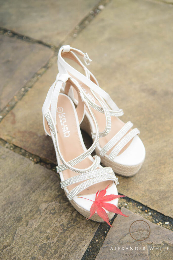 Bridal shoes with an autumn leaf