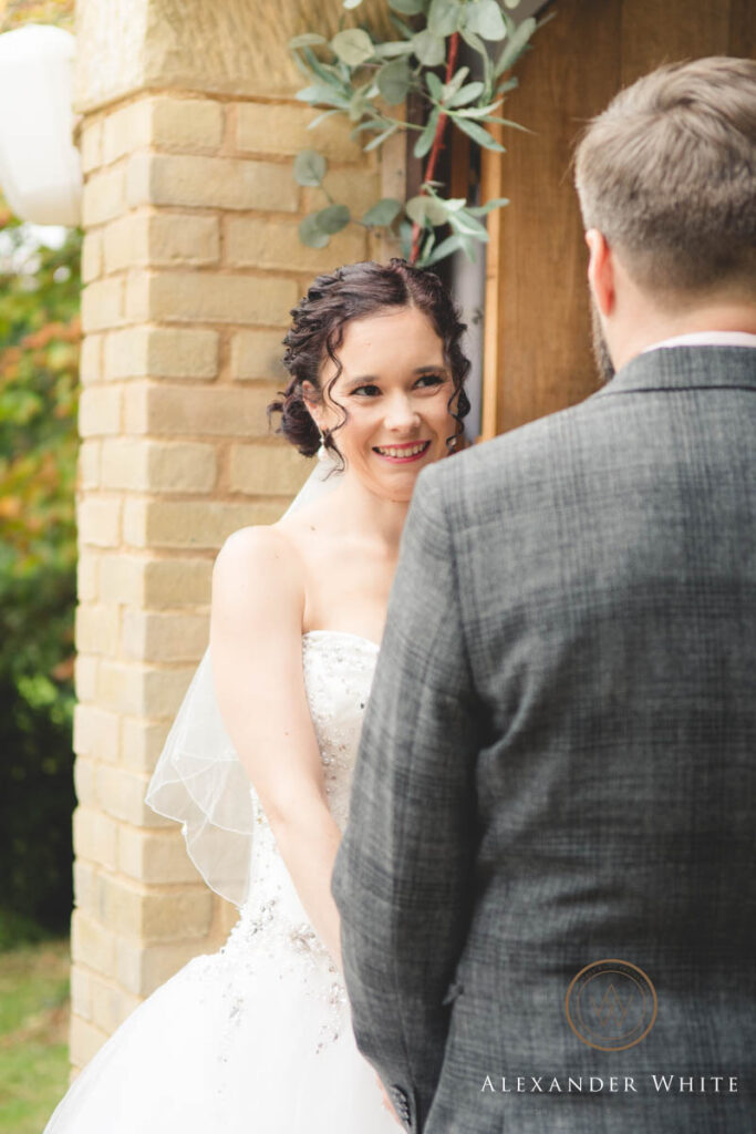 Bride smiling at the groom