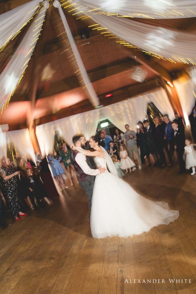 bride and groom enjoy their first dance