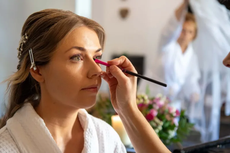 A bride having her make-up done
