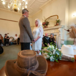 Bride and groom saying their vows at a western themed wedding at Horsham Registry Office
